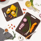 One small and one large brown kai wood fibre chopping board with vegetables 