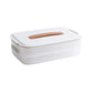stylish white container with brown silicone handle